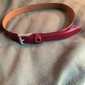 Fossil red leather belt with silver buckle. Size M. Approximately 38 inches
